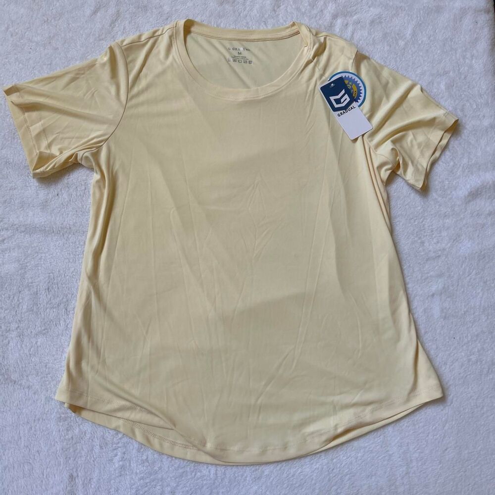 Gradual light yellow flowy workout top women's medium nwt